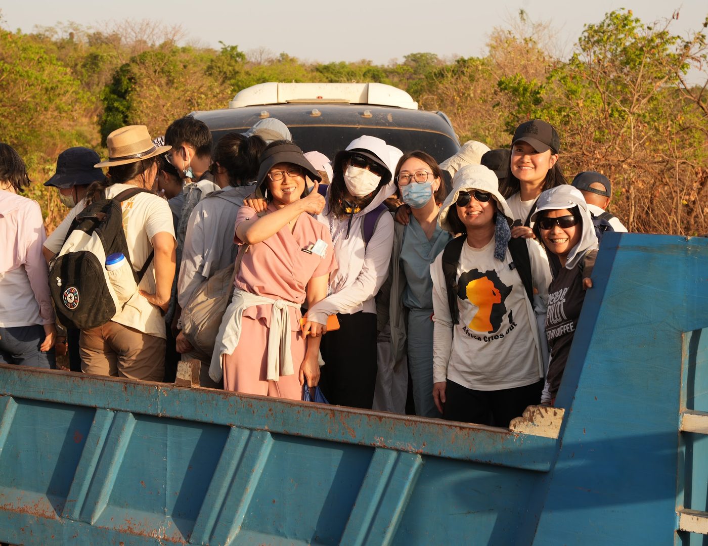 The ACO mission team crowded into the back of a blue truck on the road to a village clinic in Senegal