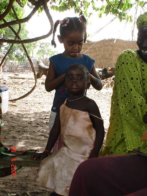 Figure 13: Pastor Ana’s daughter Emily and a child in Jingjing.